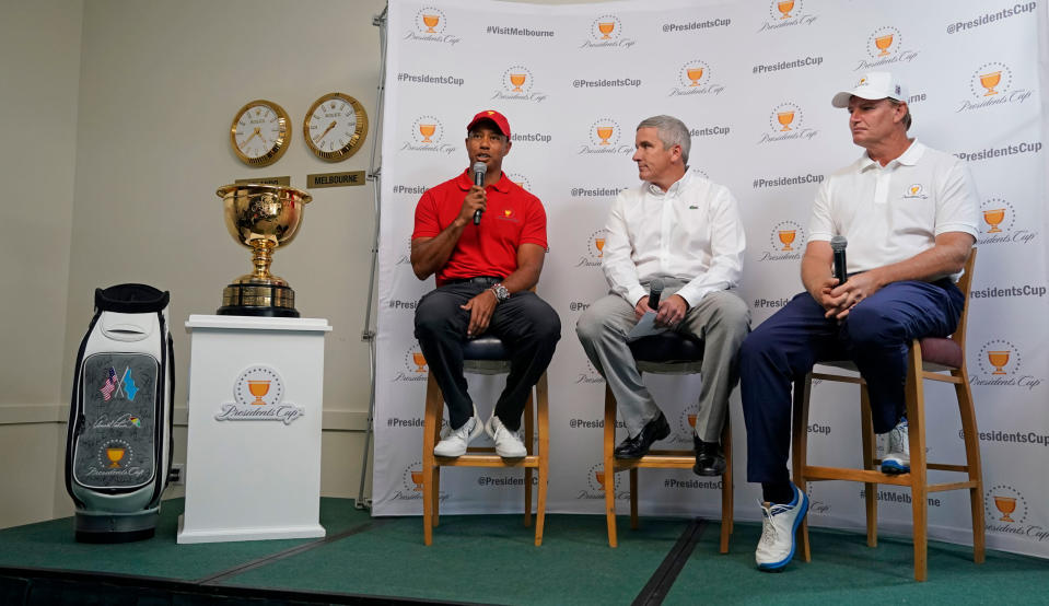 Tiger Woods, Jay Monahan and Ernie Els