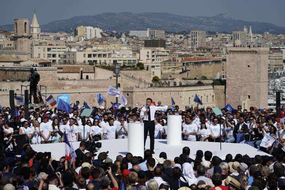 French President and centrist candidate Emmanuel Macron speaks during a campaign rally, Saturday, April 16, 2022 in Marseille, southern France. Far-right leader Marine Le Pen is trying to unseat centrist President Emmanuel Macron, who has a slim lead in polls ahead of France's April 24 presidential runoff election. (AP Photo/Laurent Cipriani)