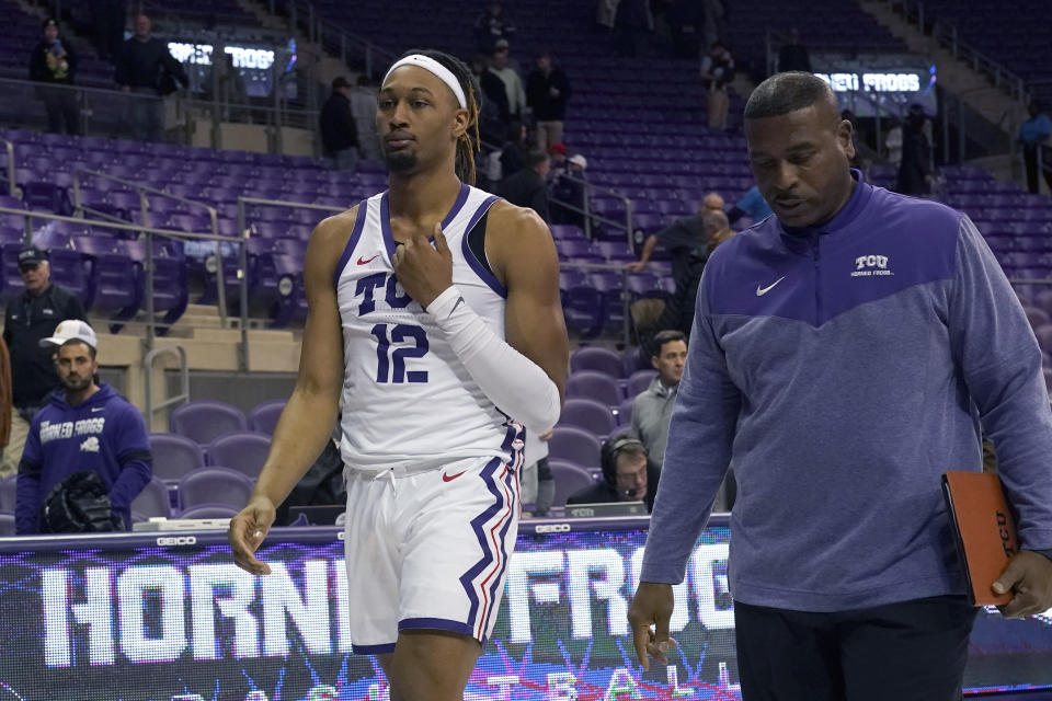 TCU forward Xavier Cork (12) walks off the floor after an NCAA college basketball game against Northwestern State in Fort Worth, Texas, Monday, Nov. 14, 2022. Northwestern State won 64-63. (AP Photo/LM Otero)