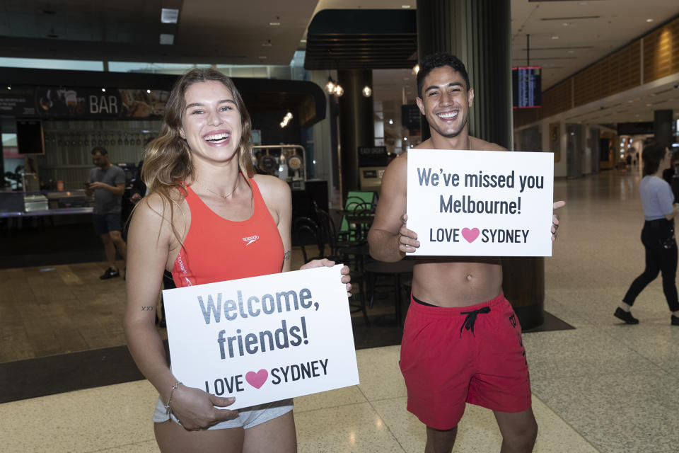 New South Wales reopened its border to Victoria at 12:01 on Monday 23 November, and it was a party in the terminal. Source: Getty
