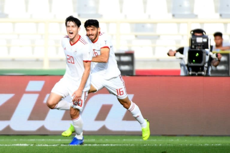 Sardar Azmoun netted both goals for in-form Iran