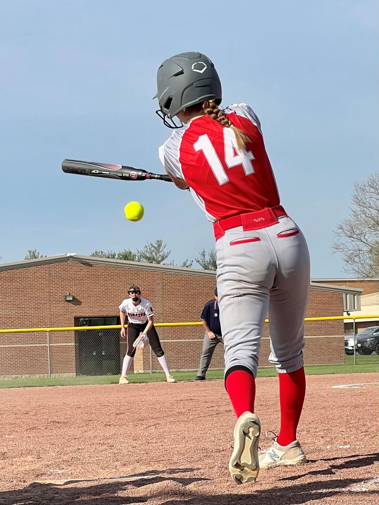 Elgin's Kyra Wilcox gets a hit during a softball game at Cardington that ended in a 7-7 tie after 12 innings due to darkness on Thursday at Cardington.