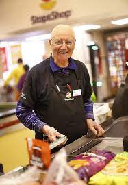 Louis San Miguel on the job as a Stop & Shop cashier in Braintree at age 94 in 2019.