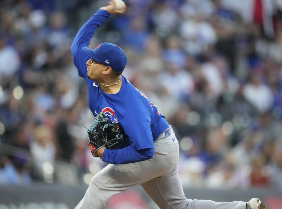 Chicago Cubs starting pitcher Javier Assad works against the Colorado Rockies during the first inning of a baseball game Tuesday, Sept. 12, 2023, in Denver. (AP Photo/David Zalubowski)