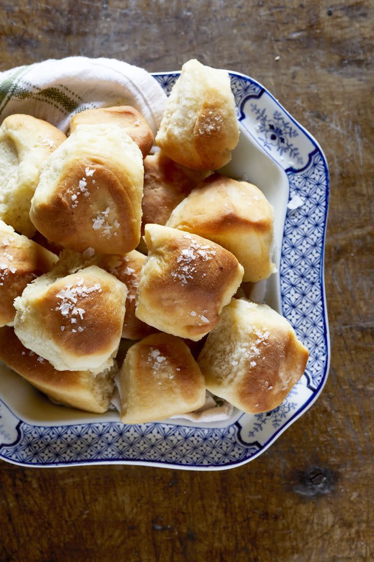 <p>You can't go wrong with fresh dinner rolls, especially these Parker House ones—which are sure to be fluffy and buttery.</p><p><strong><a href="https://www.countryliving.com/food-drinks/a29144926/nancy-fuller-parker-house-rolls/" rel="nofollow noopener" target="_blank" data-ylk="slk:Get the recipe for Parker House Rolls;elm:context_link;itc:0;sec:content-canvas" class="link ">Get the recipe for Parker House Rolls</a>.</strong> </p>