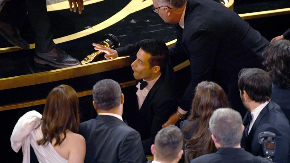 Rami Malek falling off the Oscars stage