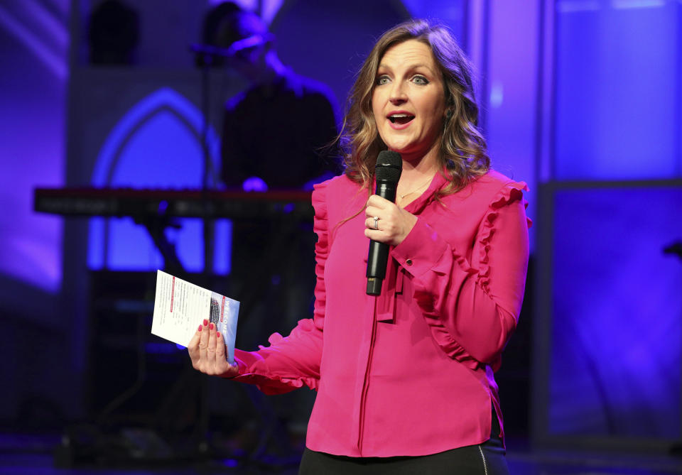 Julia Jeffress Sadler, director of a program called Next Generation which develops ministries for teens, college students, single young adults and young moms, speaks during the contemporary service at First Baptist Dallas in Dallas on Sunday, March 21, 2021. The outspoken conservative pastor, Robert Jeffress, has encouraged his daughter, Sadler, to be active in ministry, even though he cautioned her at age 11 that she couldn’t hold the title of pastor. (AP Photo/Richard W. Rodriguez)