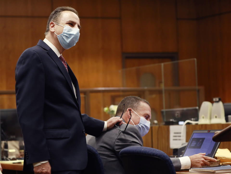 Deputy District Attorney Habib A. Balian, left, with Deputy District Attorney John Lewin, right, as the prosecution begins closing arguments Wednesday, Sept. 8, 2021 in Inglewood, Calif. Robert Durst is a champion at running from responsibility, covering his tracks with lies so numerous he couldn't keep them all straight, a prosecutor said Wednesday during closing arguments in the New York real estate heir's murder trial. (Al Seib/Los Angeles Times via AP, Pool)