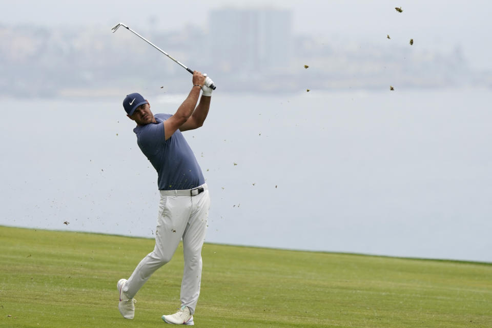 Brooks Koepka hits from the fourth fairway during the second round of the U.S. Open Golf Championship, Friday, June 18, 2021, at Torrey Pines Golf Course in San Diego. (AP Photo/Marcio Jose Sanchez)