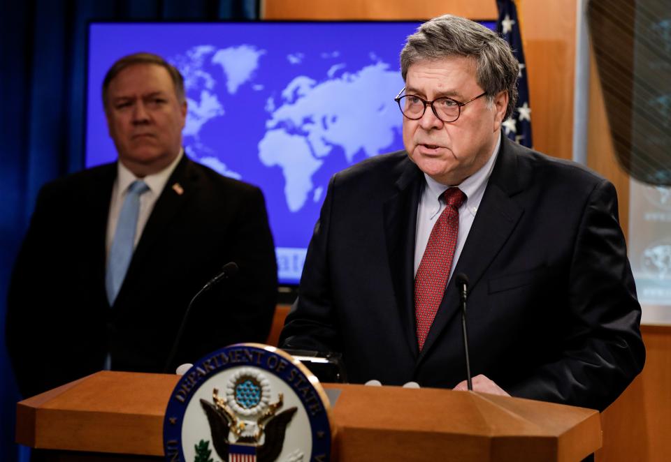 US Secretary of State Mike Pompeo (L) listens as US Attorney General William Barr speaks at a joint news conference on the International Criminal Court, at the State Department in Washington, DC, on June 11, 2020. (Yuri Gripas/AFP via Getty Images)