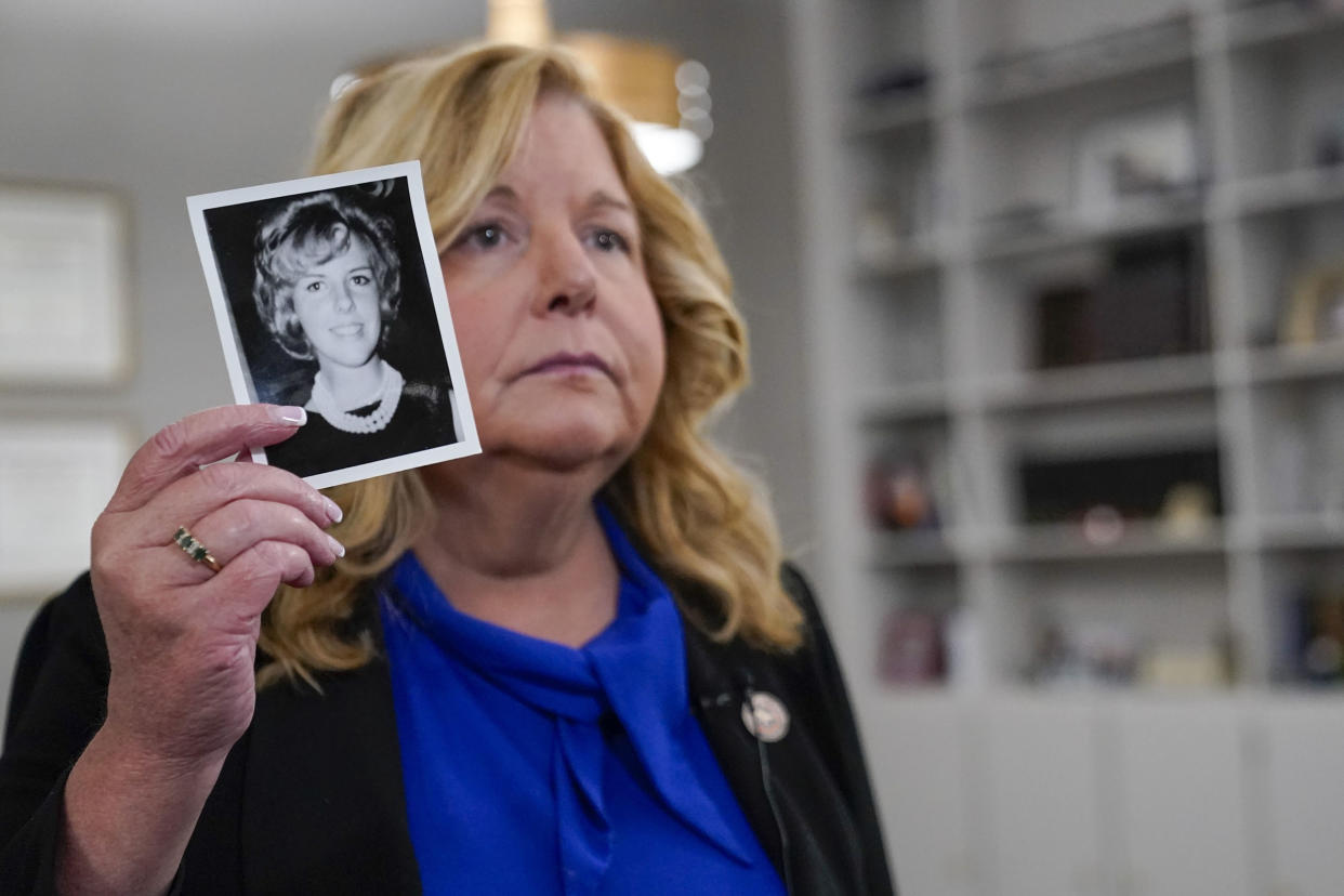Nassau County District Attorney Anne Donnelly holds a photo of Diane Cusick on June 22, 2022, in Mineola, N.Y.  (Mary Altaffer / AP)