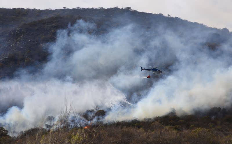 Fire burns in San Antonio de Arredondo, in Cordoba province