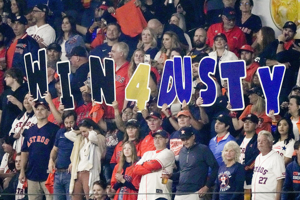 Fans cheer during the seventh inning in Game 2 of baseball's World Series between the Houston Astros and the Philadelphia Phillies on Saturday, Oct. 29, 2022, in Houston. (AP Photo/Sue Ogrocki)