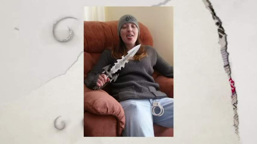 Joanne sitting on an armchair holding an ornate knife