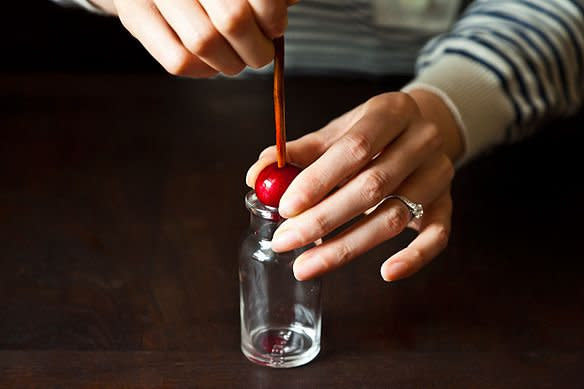 Use a chop stick and get the pits out in seconds. <a href="http://food52.com/blog/3795-hacking-a-cherry-pitter" target="_blank">Food52 shared this nifty trick</a>, and we are sold. 