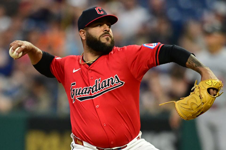 Guardians relief pitcher Pedro Avila throws a pitch against the Twins Sept. 16. He says Venezuelan people "just love life, the way they talk and treat you."