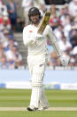 New Zealand's Tom Blundell celebrates getting 50 runs during the second day of the test match between England and New Zealand at Lord's cricket ground in London, Friday, June 3, 2022. (AP Photo/Kirsty Wigglesworth)