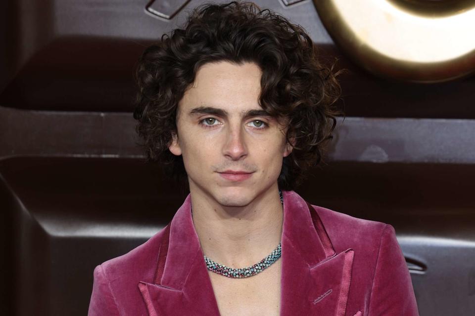 <p>Neil Mockford/FilmMagic</p> Timothee Chalamet attends the "Wonka" World Premiere at The Royal Festival Hall on November 28, 2023 