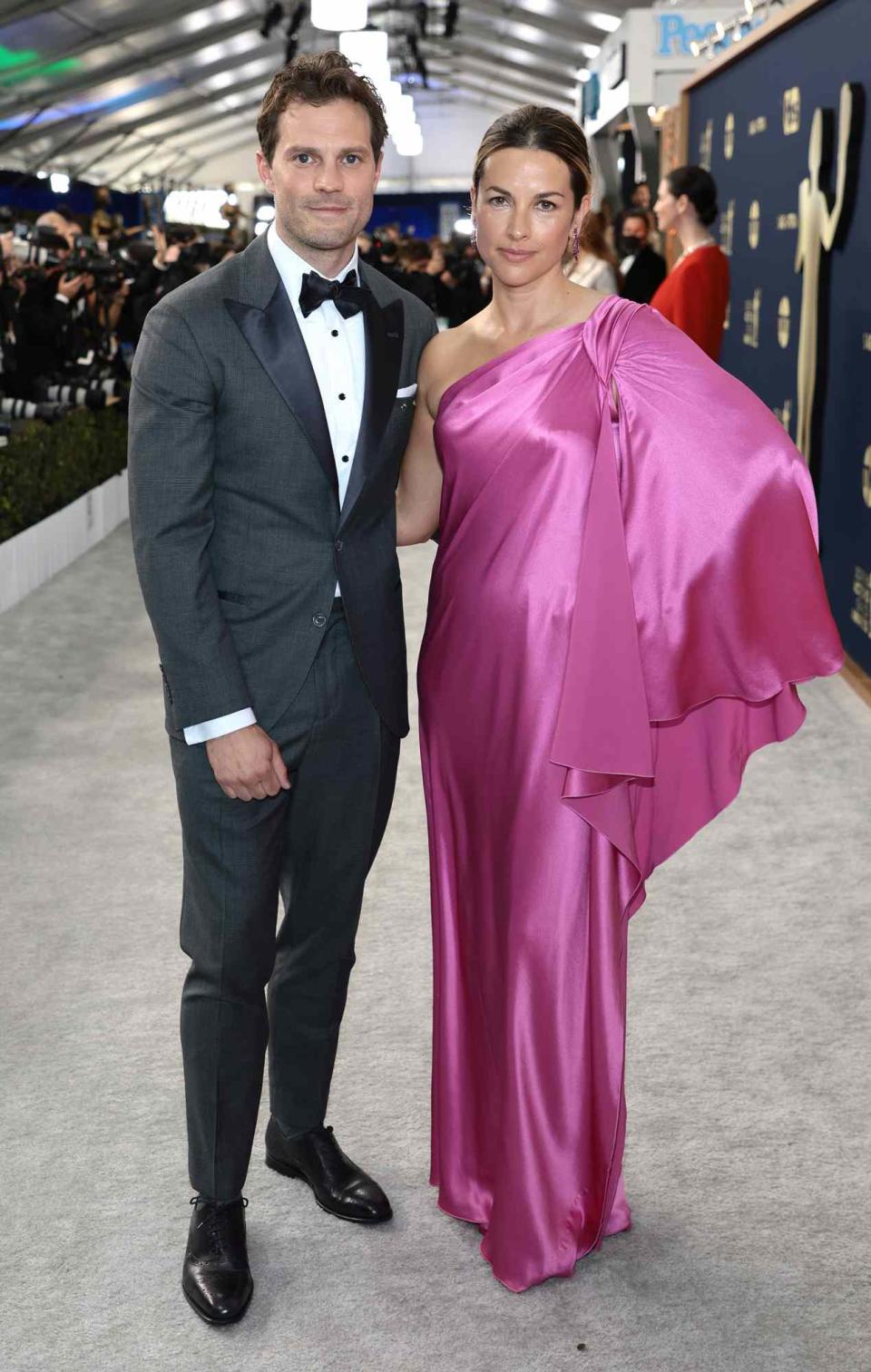 Jamie Dornan and Amelia Warner attend the 28th Screen Actors Guild Awards at Barker Hangar on February 27, 2022 in Santa Monica, California.