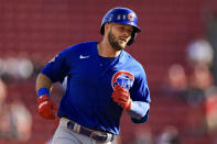 Chicago Cubs' David Bote runs the bases after hitting a three-run home run during the second inning of a baseball game against the Cincinnati Reds in Cincinnati, Wednesday, Oct. 5, 2022. (AP Photo/Aaron Doster)