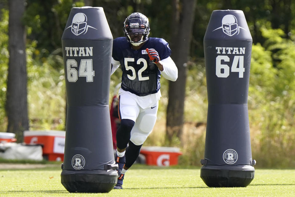 FILE - Chicago Bears linebacker Khalil Mack runs a drill during an NFL football camp practice in Lake Forest, Ill., Tuesday, Aug. 18, 2020. NFL teams can always use more pass rushers, as evidenced by the NFC North where all four teams have spent big to acquire them over the last three years. (AP Photo/Nam Y. Huh, Pool, File)