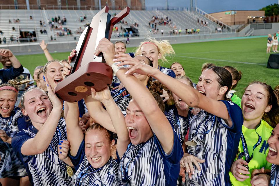 Edmond North celebrates winning the Class 6A girls state championship soccer game between Edmond North and Norman North at Taft Stadium in Oklahoma City, on Saturday, May 11, 2024.