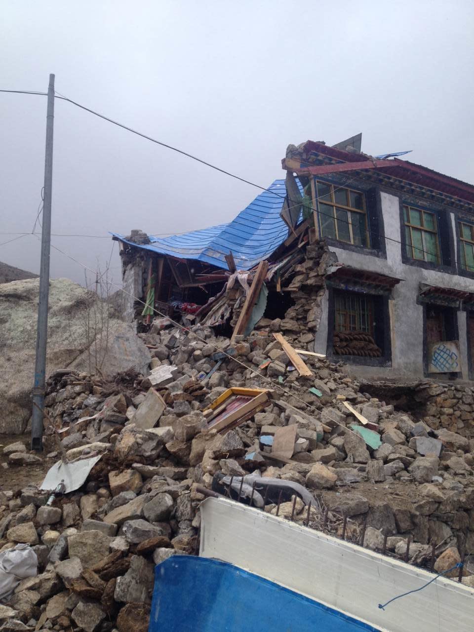 Houses collapse after tremors from the Nepal earthquake on April 25, 2015 in Tibet Autonomous Region of China. (ChinaFotoPress/ChinaFotoPress via Getty Images)
