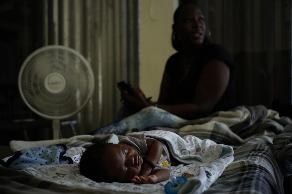 A baby sleeps inside a church that was opened up as a shelter for residents who will wait out Hurricane Dorian in Freeport on Grand Bahama, Bahamas, Sept. 1, 2019. (Photo: Ramon Espinosa/AP)