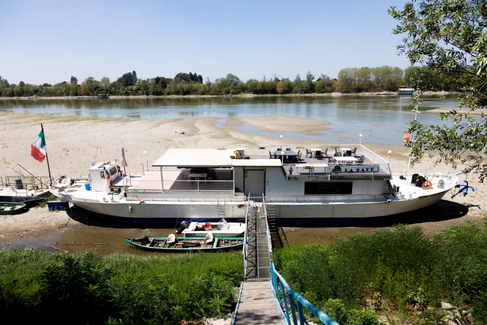 A boat moored on dry waters on the river Po in Ficarolo, Italy, on July 30, 2022.  (Nicola Ciancaglini / Ciancaphoto Studio/Getty Images file )