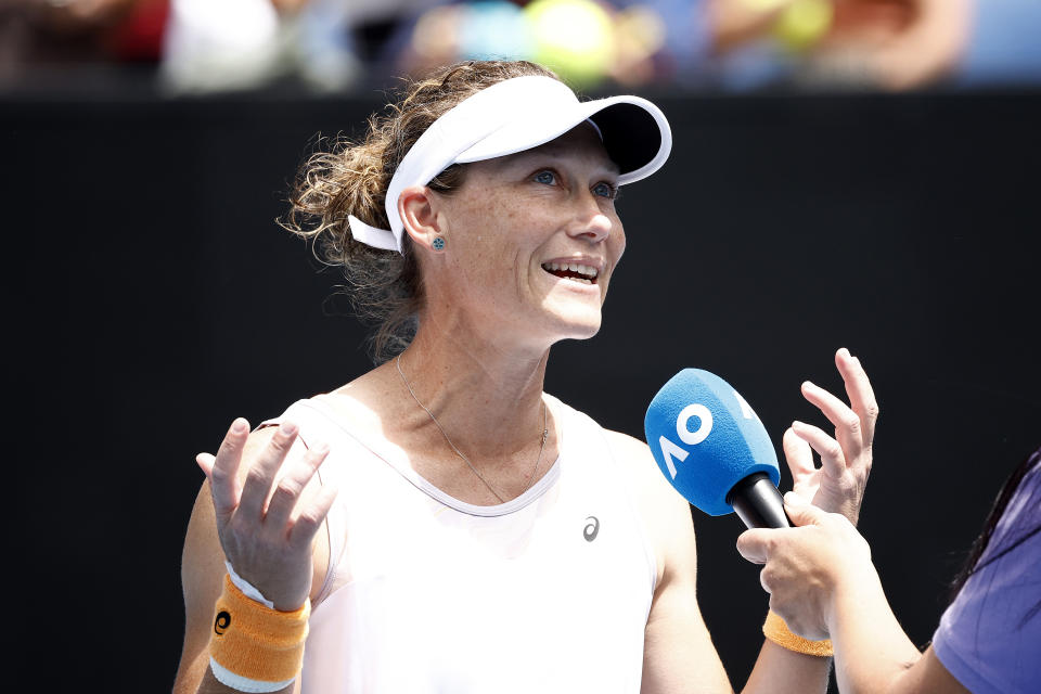 Sam Stosur, pictured here speaking on court after her loss in the women's doubles at the Australian Open.