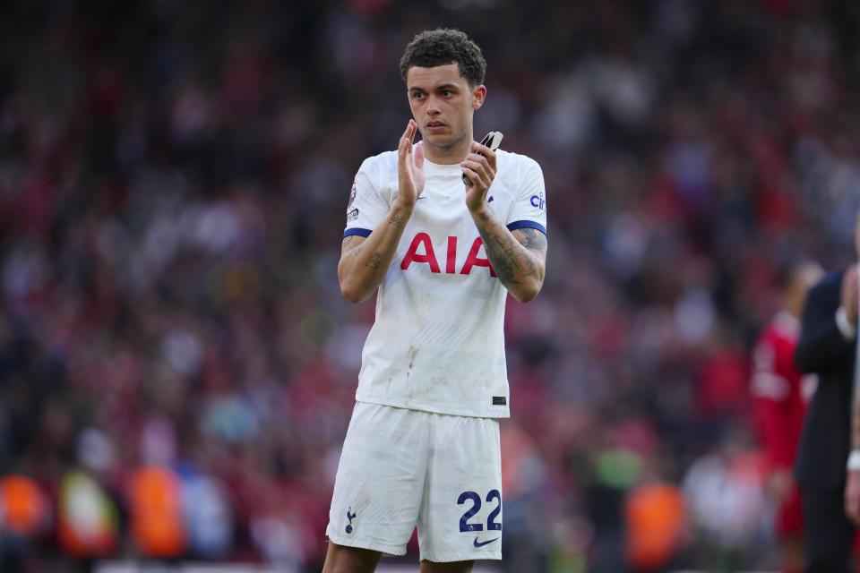 Tottenham's Brennan Johnson applauds supporters at the end of the English Premier League soccer match between Liverpool and Tottenham Hotspur at Anfield Stadium in Liverpool, England, Sunday, May 5, 2024. (AP Photo/Jon Super)