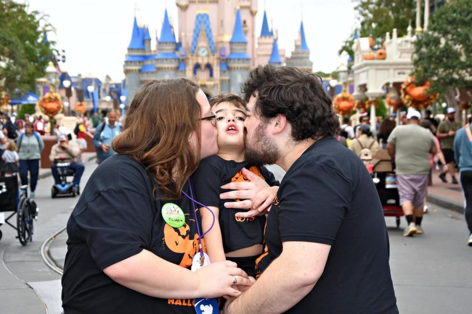 Elliott Althouse, of Monroe, who turns 5 years old today, is embraced by his parents Amanda and Bryce Althouse at the Magic Kingdom at Walt Disney World. The family recently traveled to Florida thanks to the Make-A-Wish Foundation. Elliott is dealing with a very rare syndrome called Lennox-Gastaut Syndrome, a lifelong and aggressive form of epilepsy.