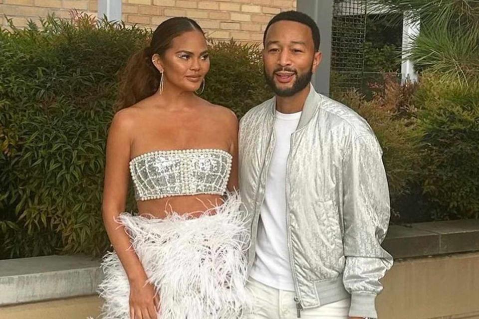 <p>John Legend/Instagram</p> Chrissy Teigen and John Legend wear silver for Beyoncé show in Vancouver