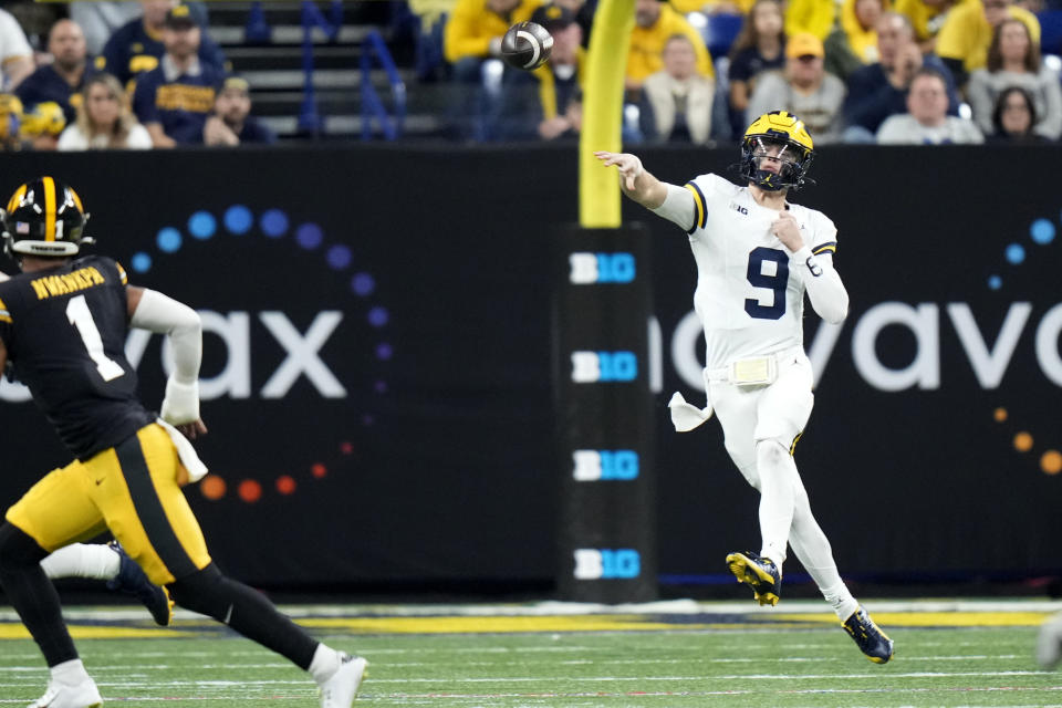 Michigan quarterback J.J. McCarthy (9) throws a pass during the first half of the Big Ten championship NCAA college football game against Iowa, Saturday, Dec. 2, 2023, in Indianapolis. (AP Photo/AJ Mast)