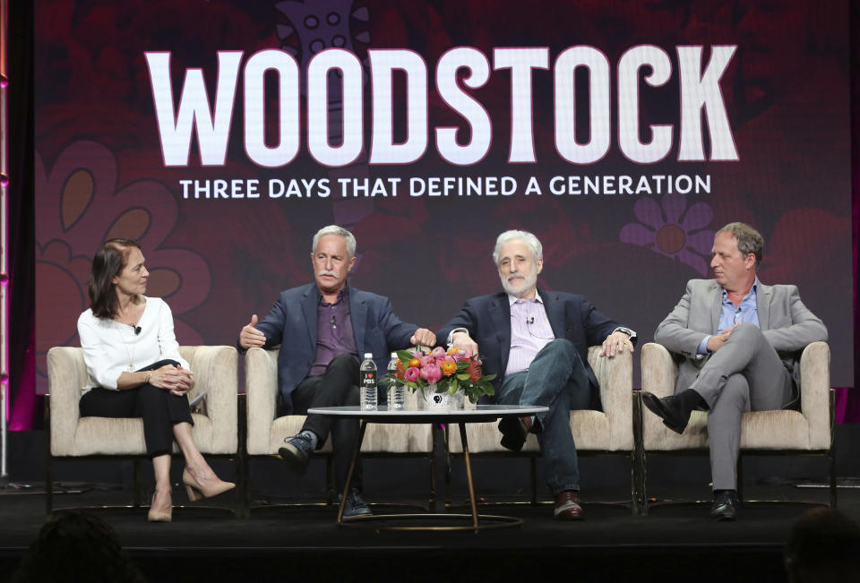 Senior producer Susan Bellows, from left, author Joel Makower, Joel Rosenman, co-producer of the 1969 Woodstock festival, and director/writer/producer Barak Goodman participate in PBS's "Woodstock" panel at the Television Critics Association Summer Press Tour on Tuesday, July 30, 2019, in Beverly Hills, Calif. (Photo by Willy Sanjuan/Invision/AP)