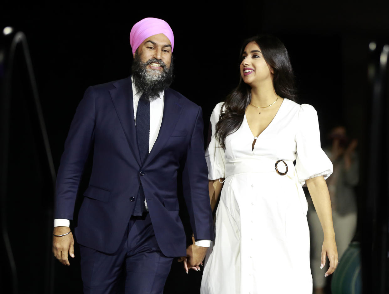 VANCOUVER, BC - SEPTEMBER 20: New Democratic Party Leader Jagmeet Singh celebrates with his wife Gurkiran Kaur Sidhu at an election night event on September 20, 2021 in Vancouver, Canada. For the first time in a decade, the New Democratic Party will have more seats in parliament than they had at the start of the election, picking up an additional three seats for a projected total of 27. (Photo by Jeff Vinnick/Getty Images)