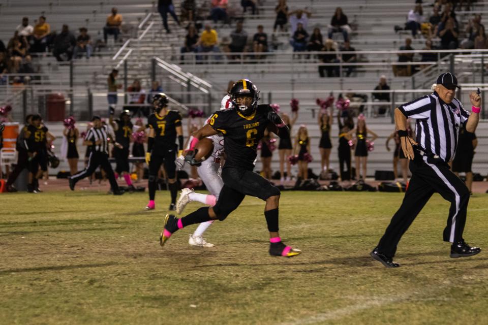 Yucca Valley's Myles Harper (6) making a sprint to the end-zone against Desert Mirage, Oct. 20, 2023.