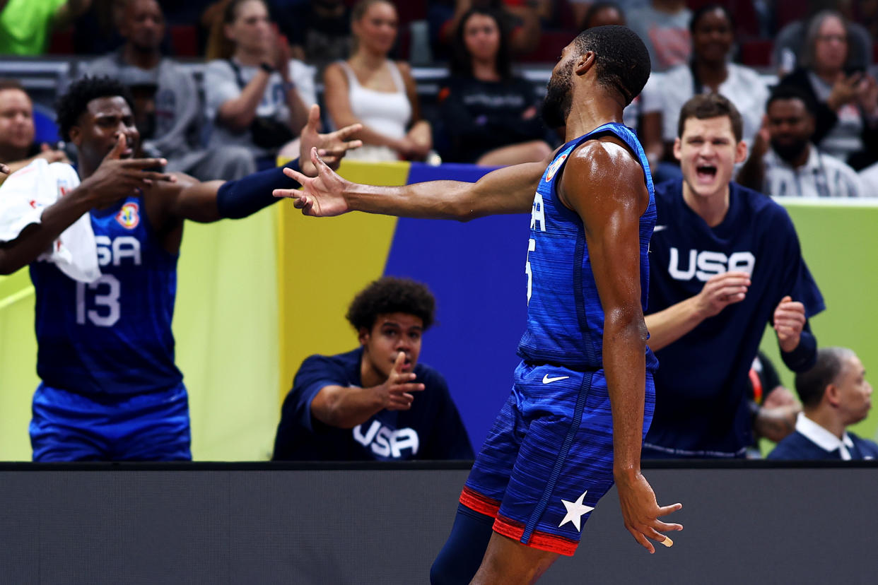 MANILA, PHILIPPINES - SEPTEMBER 05: Mikal Bridges #5 of the United States celebrates towards the bench after scoring a three-pointer in the second quarter during the FIBA Basketball World Cup quarterfinal game against Italy at Mall of Asia Arena on September 05, 2023 in Manila, Philippines. (Photo by Yong Teck Lim/Getty Images)