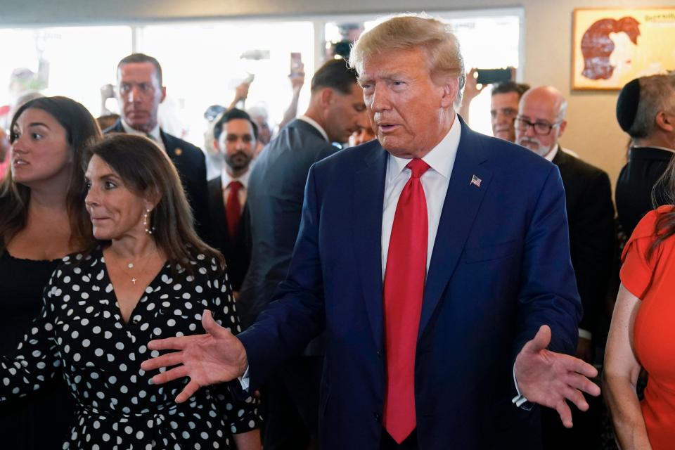 Former President Donald Trump speaks as he visits Versailles restaurant on Tuesday, June 13, 2023, in Miami.