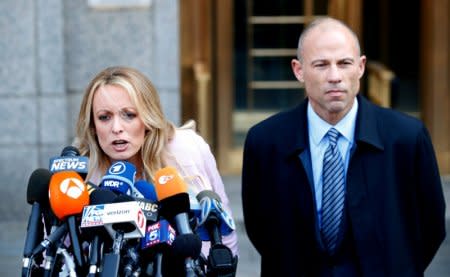 FILE PHOTO:  Adult film actress Stephanie Clifford, also known as Stormy Daniels, speaks to media along with lawyer Michael Avenatti outside federal court in the Manhattan borough of New York City, New York, U.S., April 16, 2018. REUTERS/Brendan Mcdermid/File Photo