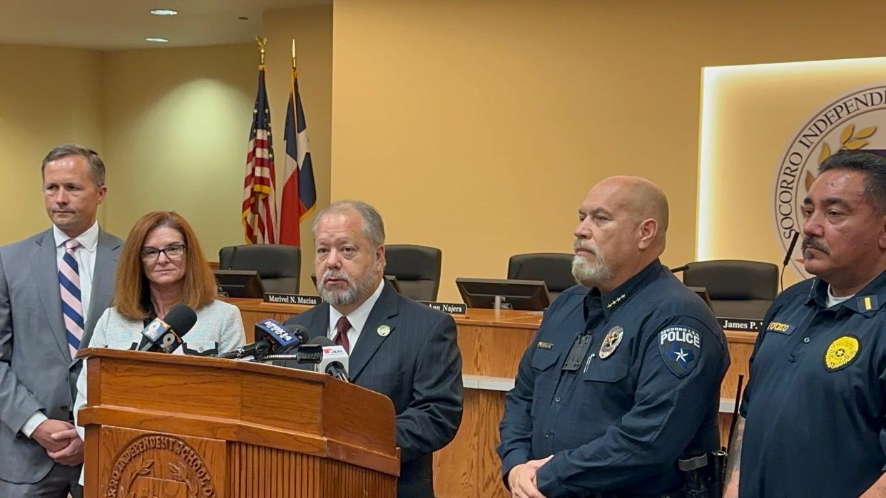 El Paso District Attorney Bill HIcks, center, discusses a video warning students of making school threats during a news conference Sept. 4, 2024, at the Socorro Independent School District's District Service Center.