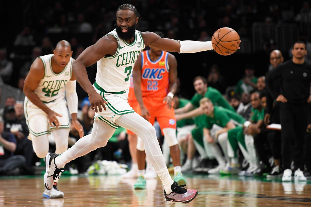 Apr 3, 2024; Boston, Massachusetts, USA; Boston Celtics guard Jaylen Brown (7) controls the ball during the second half against the Oklahoma City Thunder at TD Garden. Mandatory Credit: Bob DeChiara-USA TODAY Sports ORG XMIT: IMAGN-719352 ORIG FILE ID: 20240403_ams_ad7_196.JPG