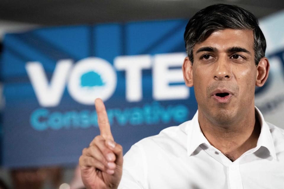 Prime Minister Rishi Sunak speaks during his visit to Amersham and Chiltern RFC (Aaron Chown/PA) (PA Wire)