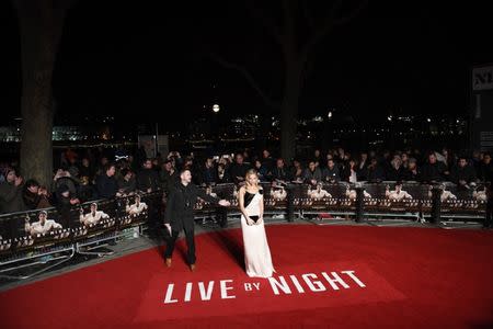 Sienna Miller arrives at the European Premiere of Live by Night at the British Film Institute in London, Britain January 11, 2017. REUTER/Dylan Martinez