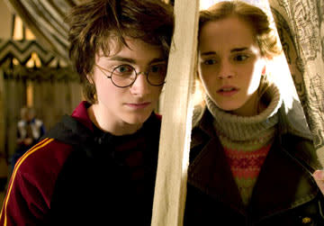 <p>Daniel Radcliffe as Harry Potter and Emma Watson as Hermione Granger in Warner Bros. Pictures' Harry Potter and the Goblet of Fire - 2005</p>