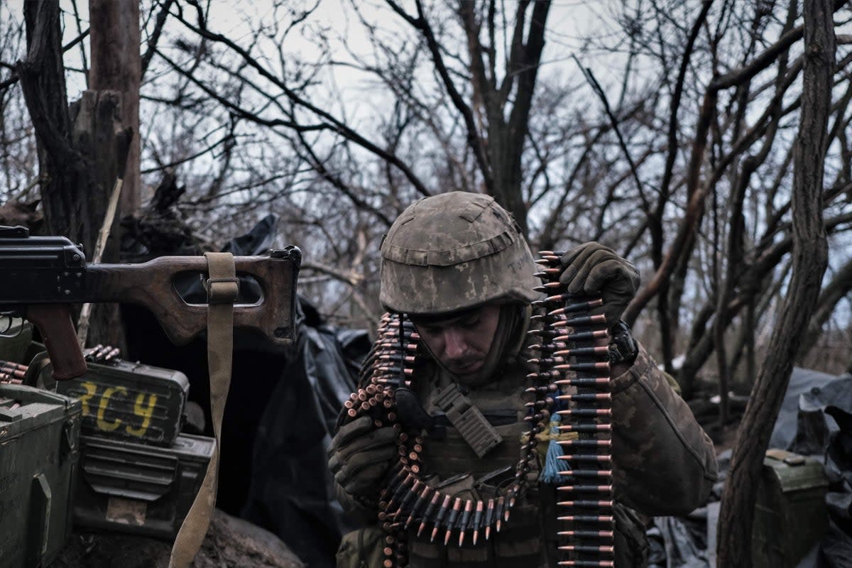 A soldier of the Ukrainian Volunteer Army prepares ammunition to fire at Russian front line positions near Bakhmut in the east of the country  (AFP via Getty Images)