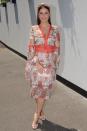 <p>TV presenter Lauren Phillips also channelled a red floral theme in a semi-sheer Bronx and Banco frock and Viktoria Novak headband.</p>