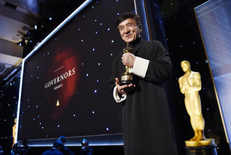 Honoree Jackie Chan poses onstage at the 2016 Governors Awards at the Dolby Ballroom on Saturday, Nov. 12, 2016, in Los Angeles. (Photo by Chris Pizzello /Invision/AP)