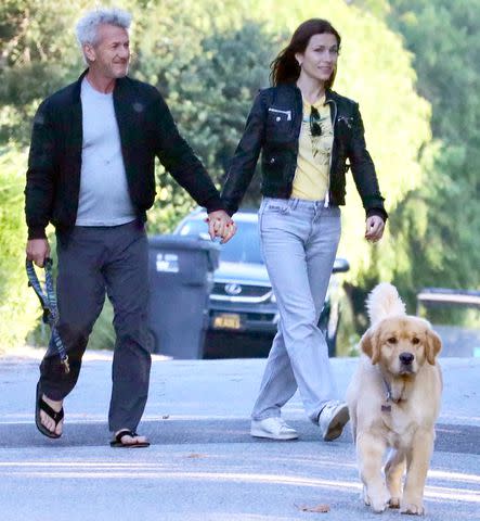 <p>MEGA</p> Penn and Korotyayeva were spotted on a dog walk in Malibu Sunday
