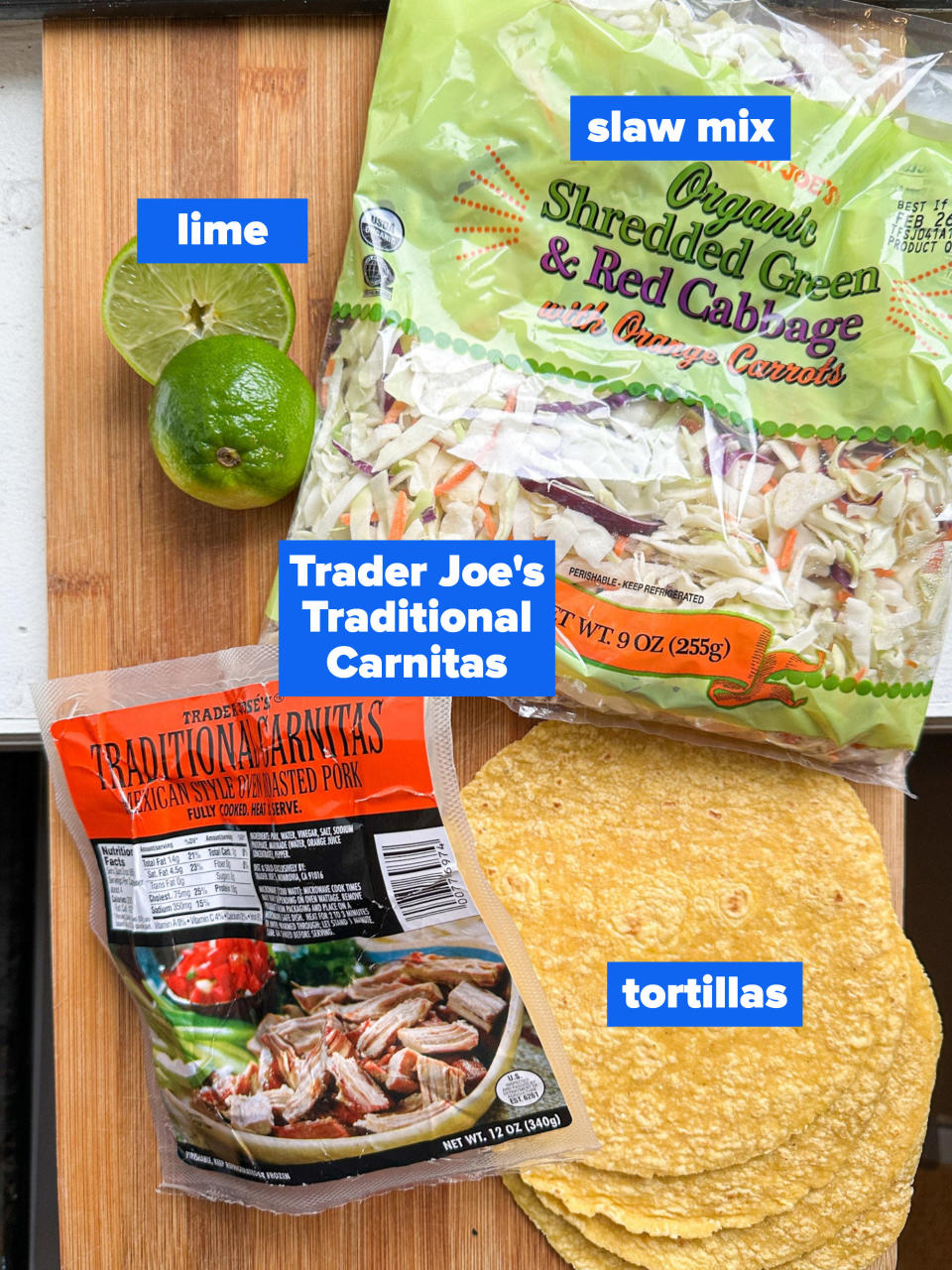 the ingredients: slaw mix, lime, trader joe's traditional carnitas, tortillas